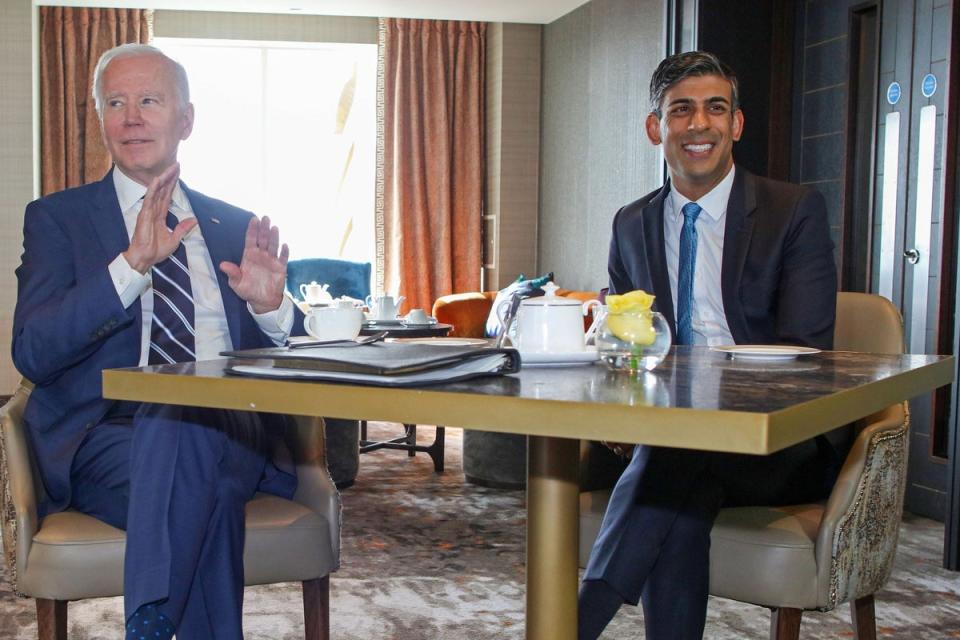 Joe Biden with Rishi Sunak at the Grand Central Hotel in Belfast (PA)