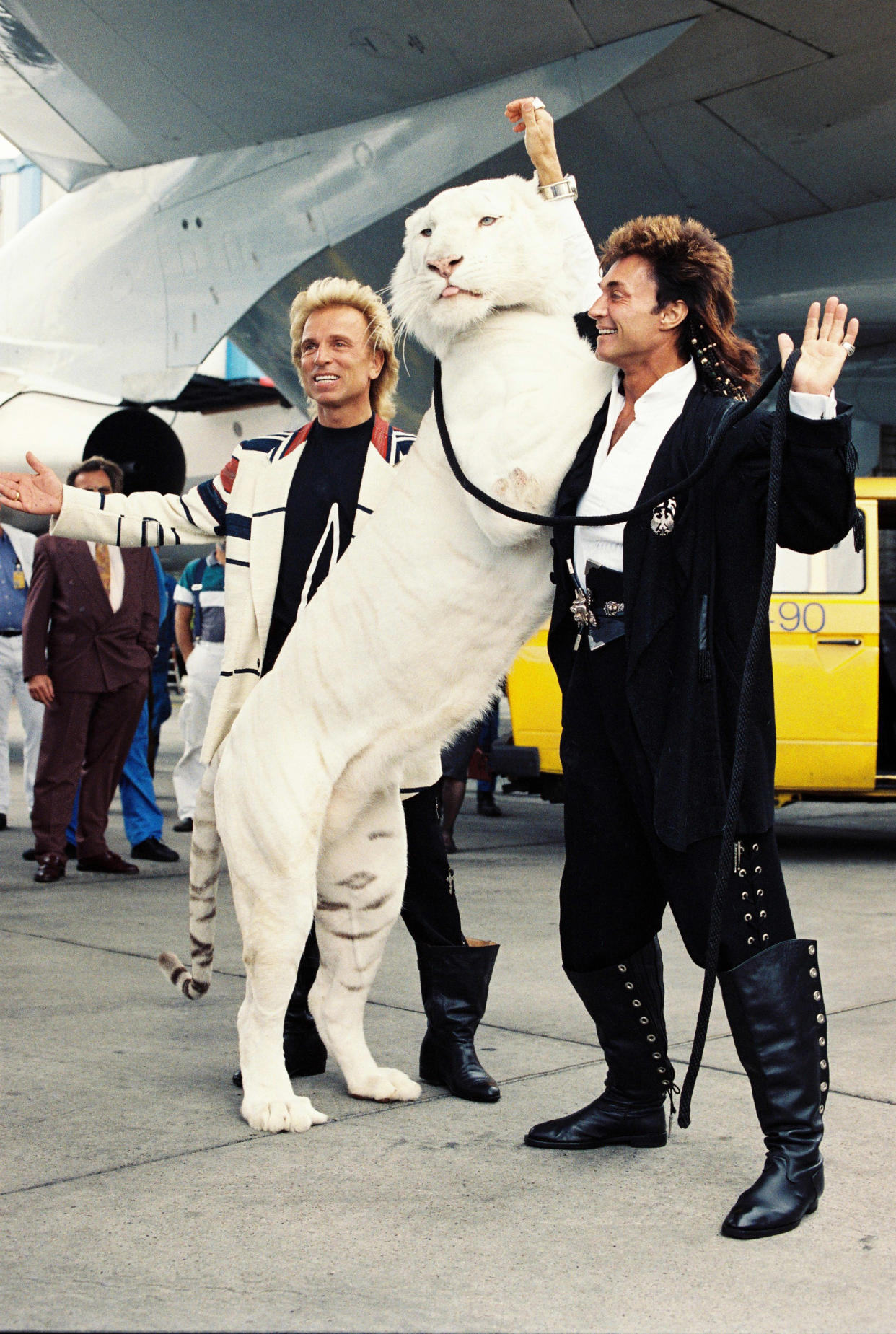 Siegfried and Roy pose with one of their tigers soon after they signed a five-year contract at the Mirage in 1987.