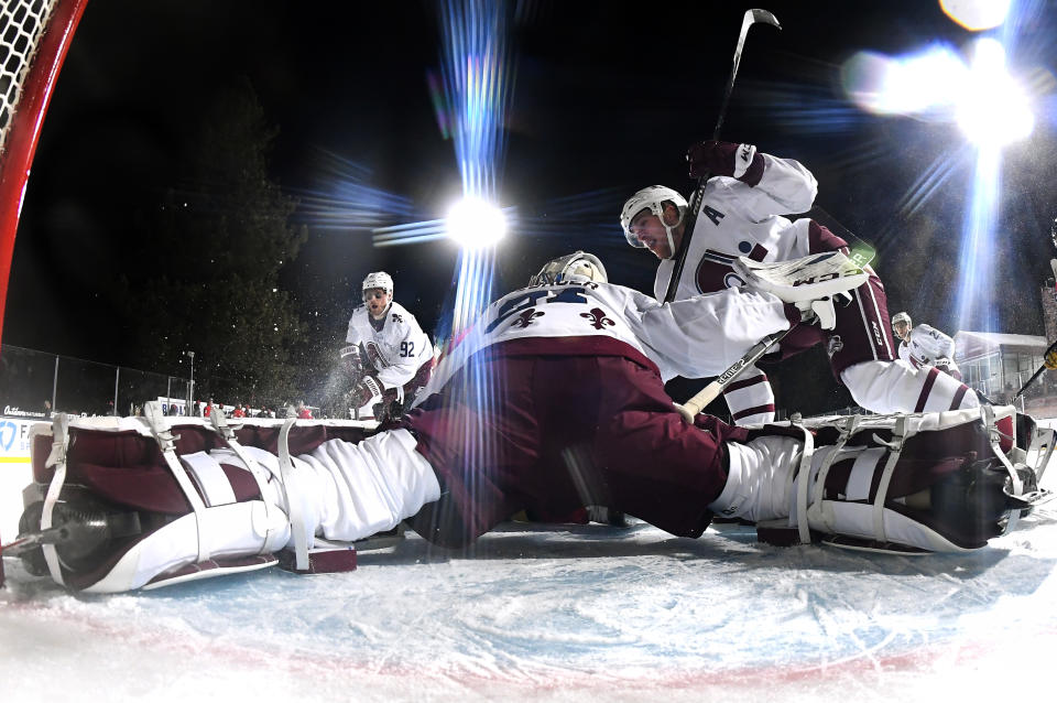 <p>Goaltender Philipp Grubauer #31 of the Colorado Avalanche stretches to make a save against the Vegas Golden Knights during the second period of the 2021 Bridgestone NHL Outdoors Saturday on the 18th fairway of the Edgewood Tahoe Resort, at the south shore of Lake Tahoe on February 20, 2021 in Stateline, Nevada. (Photo by Brian Babineau/NHLI via Getty Images)</p> 