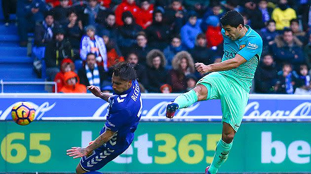 Suarez goes head-to-head with fellow Uruguayan Cavani. Pic: Getty