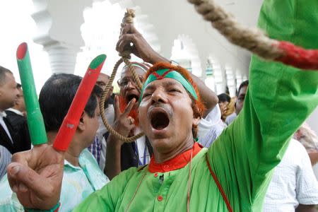 A protester reacts outside the Bangladesh Supreme Court on May 5, 2016, after it rejected the final appeal by Motiur Rahman Nizami against his death sentence. REUTERS/Ashikur Rahman