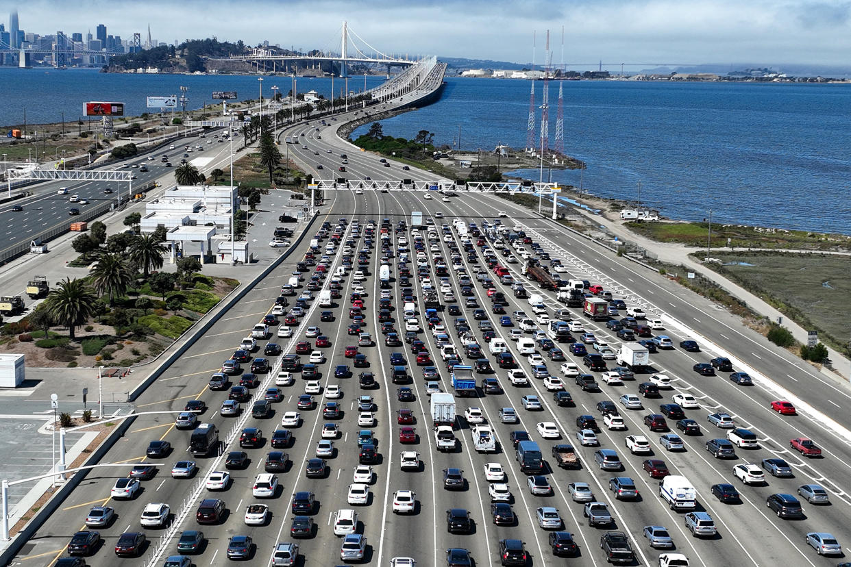 Image:  Traffic at the San Francisco-Oakland Bay Bridge toll plaza on Aug. 24, 2022. (Justin Sullivan / Getty Images)