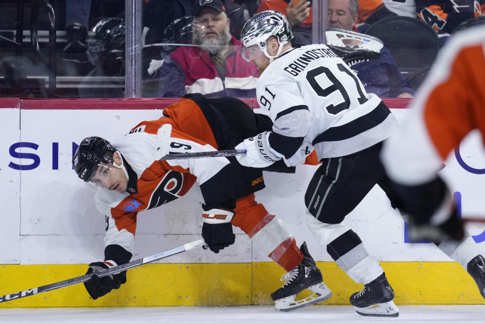 Philadelphia Flyers' Garnet Hathaway, left, and Los Angeles Kings' Carl Grundstrom collide during the third period of an NHL hockey game, Saturday, Nov. 4, 2023, in Philadelphia. (AP Photo/Matt Slocum)