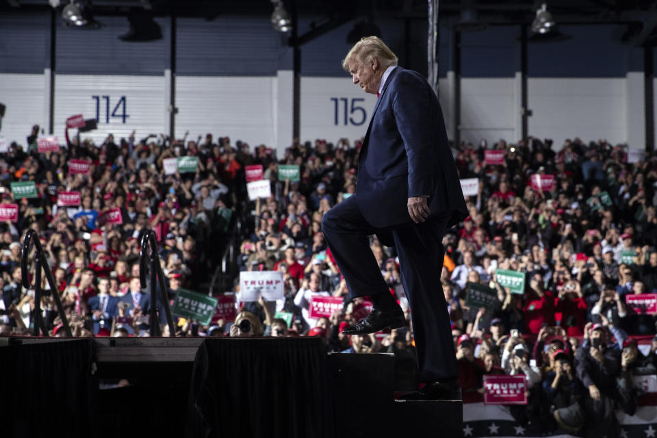 President Donald Trump arrives at W.K. Kellogg Airport to attend a campaign rally, Wednesday, Dec. 18, 2019, in Battle Creek, Mich. (AP Photo/ Evan Vucci)