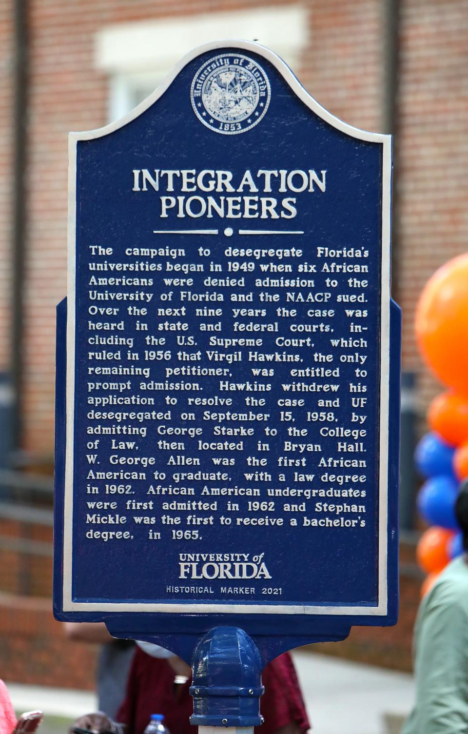 A historical marker for first Black students to attend and graduate from the University of Florida, on the UF campus in Gainesville.