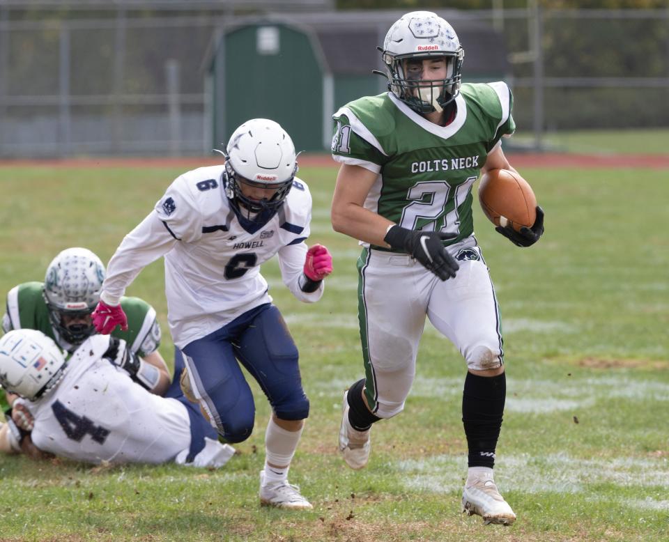 Colts Nick Chris Scully takes ball down left side for his team’s first touchdown. Colts Neck football defeats Howell in Colts Neck, NJ on October 8, 2022. 