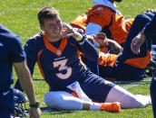 Denver Broncos quarterback Drew Lock (3) jokes during a Denver Broncos OTA at the team's headquarters, Monday, May 24, 2021, in Englewood, Colo. (AP Photo/Jack Dempsey)