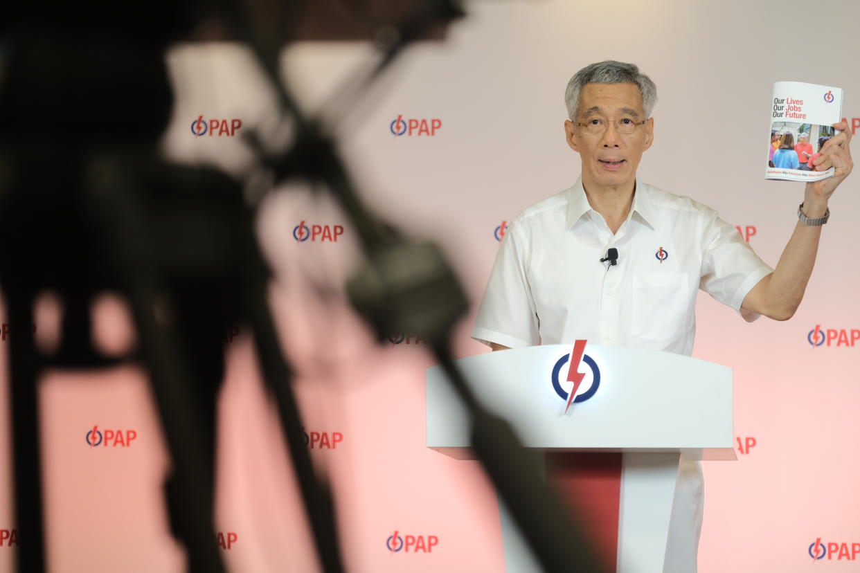 PAP secretary-general Lee Hsien Loong unveiling the party's manifesto for GE2020. (Photo: PAP)