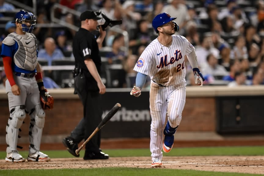 New York Mets first baseman Pete Alonso (20) hits a two run home run against the Chicago Cubs during the fourth inning at Citi Field.