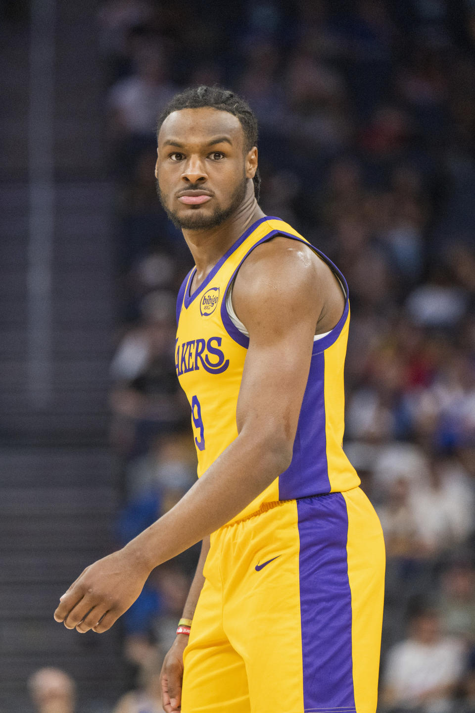 Los Angeles Lakers guard Bronny James watches the action during the first half of an NBA summer league basketball game against the Sacramento Kings in San Francisco, Saturday, July 6, 2024. (AP Photo/Nic Coury)