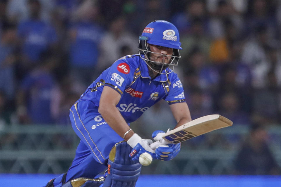 Mumbai Indians Nehal Wadhera watches the ball after playing a shot during the Indian Premier League cricket match between Lucknow Super Giants and Mumbai Indians in Lucknow, India, Tuesday, April 30, 2024. (AP Photo/Pankaj Nangia)