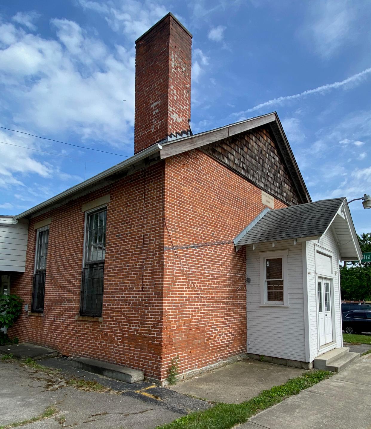 A former one-room schoolhouse at 860 S. Sunbury Road is part of a conceptual plan for a mixed-use development by Columbus Design, LLC. It's being eyed for a possible coffee, ice cream or pastry shop.