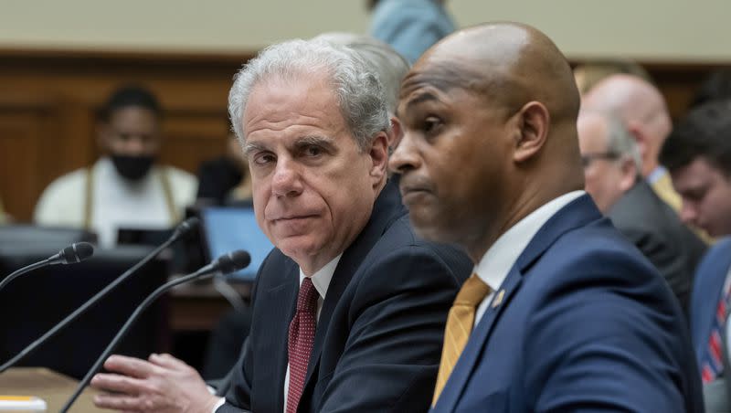 Michael Horowitz, left, who chairs a watchdog panel with oversight of COVID-19 spending, and David Smith, an assistant director of the Office of Investigations at the U.S. Secret Service, testifies before the House Oversight and Accountability Committee about waste and fraud in COVID-19 relief programs, at the Capitol in Washington, Wednesday, Feb. 1, 2023.