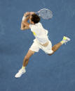 Russia's Daniil Medvedev hits a backhand to Serbia's Novak Djokovic during the men's singles final at the Australian Open tennis championship in Melbourne, Australia, Sunday, Feb. 21, 2021. (AP Photo/Hamish Blair)