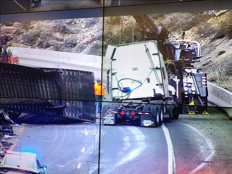 Crashed commercial motor vehicle on I-70 in Glenwood Canyon at Mile Point 129 on July 21, 2022. Guardrail was damaged by the crash. The CMV was traveling westbound.