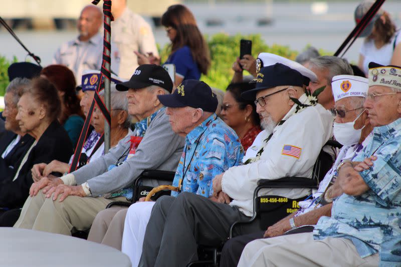 Pearl Harbor survivors and other military veterans observe a ceremony on Wednesday, Dec. 7, 2022, in Pearl Harbor, Hawaii in remembrance of those killed in the 1941 attack. (Audrey McAvoy/AP)<cite class="op-small">(Audrey McAvoy)</cite>