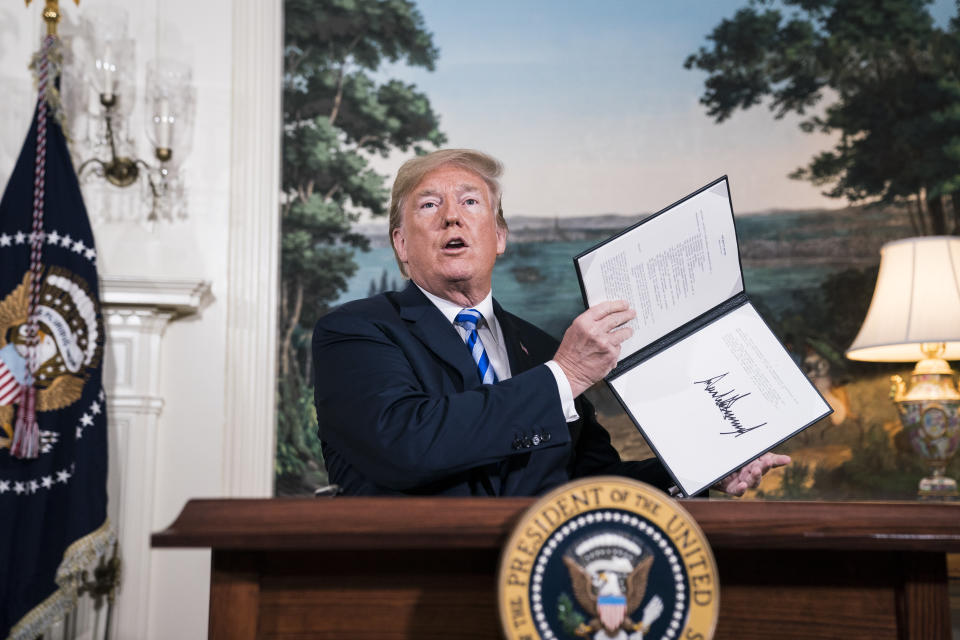 President Donald J. Trump signs a National Security Presidential Memorandum as he announces the withdrawal of the United States from the Iran nuclear deal during a "Joint Comprehensive Plan of Action" event in the Diplomatic Reception Room of the White House on May 8, 2018 in Washington, DC. (Photo: Jabin Botsford/The Washington Post via Getty Images)