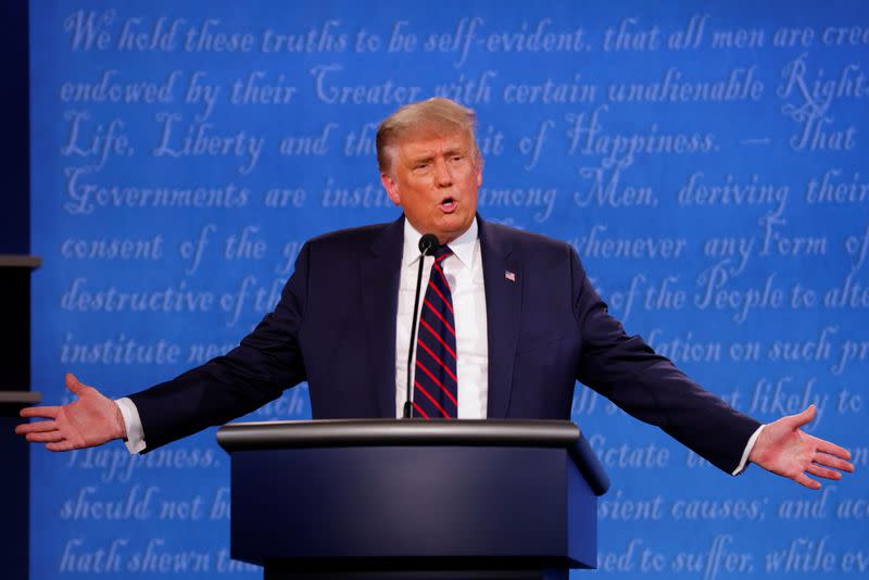 U.S. President Donald Trump and Democratic presidential nominee Joe Biden participate in their first 2020 presidential campaign debate in Cleveland