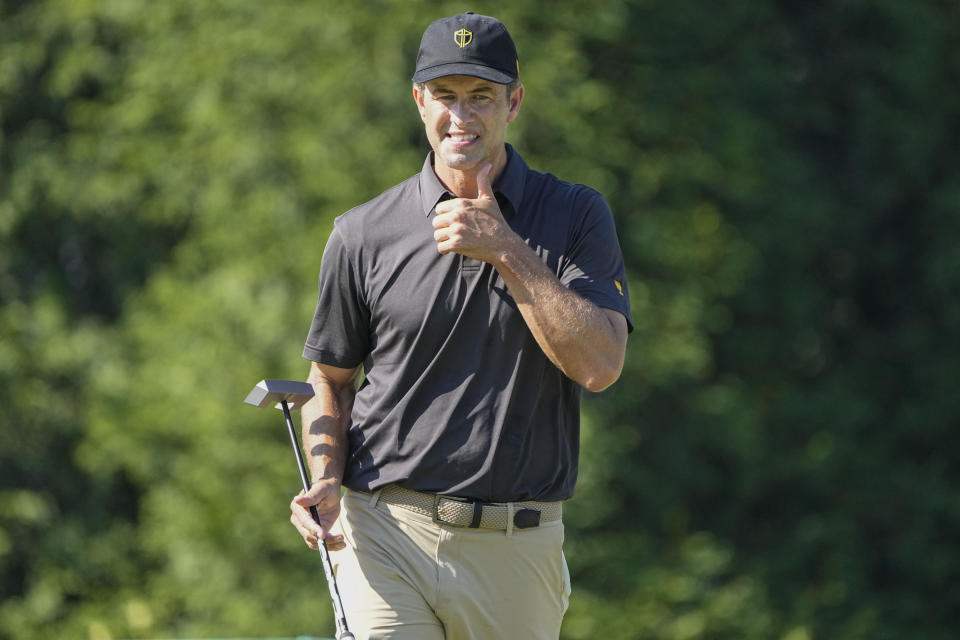 Adam Scott, of Australia, walks on the fifth hole during practice for the Presidents Cup golf tournament at the Quail Hollow Club, Tuesday, Sept. 20, 2022, in Charlotte, N.C. (AP Photo/Chris Carlson)