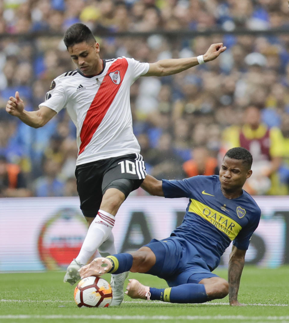 FILE - In this Nov. 11, 2018, file photo, Gonzalo Martinez of Argentina's River Plate (10) and Wilmar Barrios of Argentina's Boca Juniors battle for the ball during a Copa Libertadores first leg final match in Buenos Aires, Argentina. Martinez has been acquired by Atlanta United, bolstering a team that won the MLS Cup championship in just its second season. United announced the long-anticipated transfer on Thursday, Jan. 24, 2019. (AP Photo/Natacha Pisarenko, File)