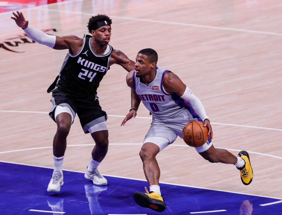 Dennis Smith Jr. dribbles against Kings guard Buddy Hield during the first half.