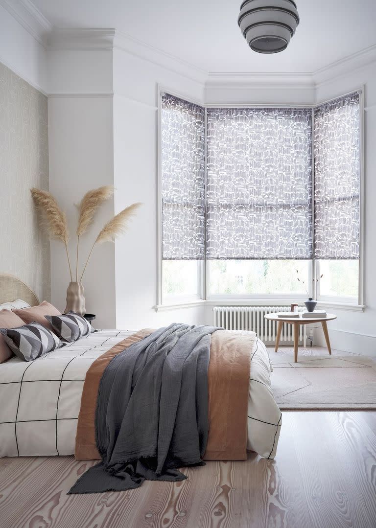 <p>Matchsticks Mono is a stylish illustrative fabric featuring angled geo lines. It would look fantastic in any interior, and it works especially well in a bedroom, as pictured here. It really complements this pared-back Scandi vibe alongside a palette of burnt orange and subtle pinks.</p><p><a class="link " href="https://www.hillarys.co.uk/products/matchsticks-mono-roller-blind/" rel="nofollow noopener" target="_blank" data-ylk="slk:Order a sample and request an appointment;elm:context_link;itc:0;sec:content-canvas">Order a sample and request an appointment</a></p>