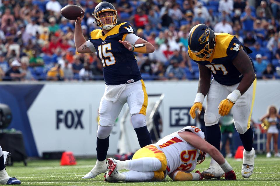 Memphis Showboats quarterback Cole Kelley (15) passes the ball during the first half against the Philadelphia Stars at Simmons Bank Liberty Stadium.
