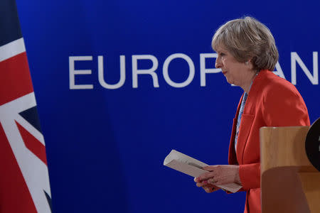 Britain's Prime Minister Theresa May leaves after a news conference at the end of the EU summit in Brussels, Belgium October 21, 2016. REUTERS/Eric Vidal