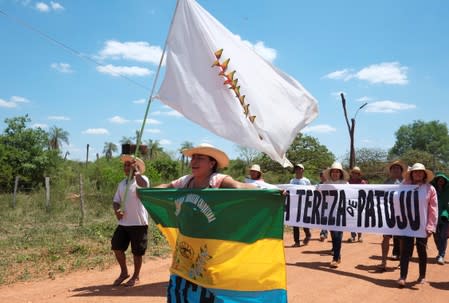 People march during the 10th Indigenous March to defend Mother Earth near San Jose