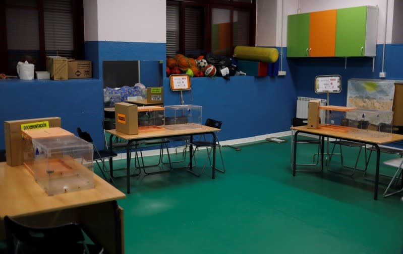 Ballot boxes are seen in a polling station ahead of general election in Madrid