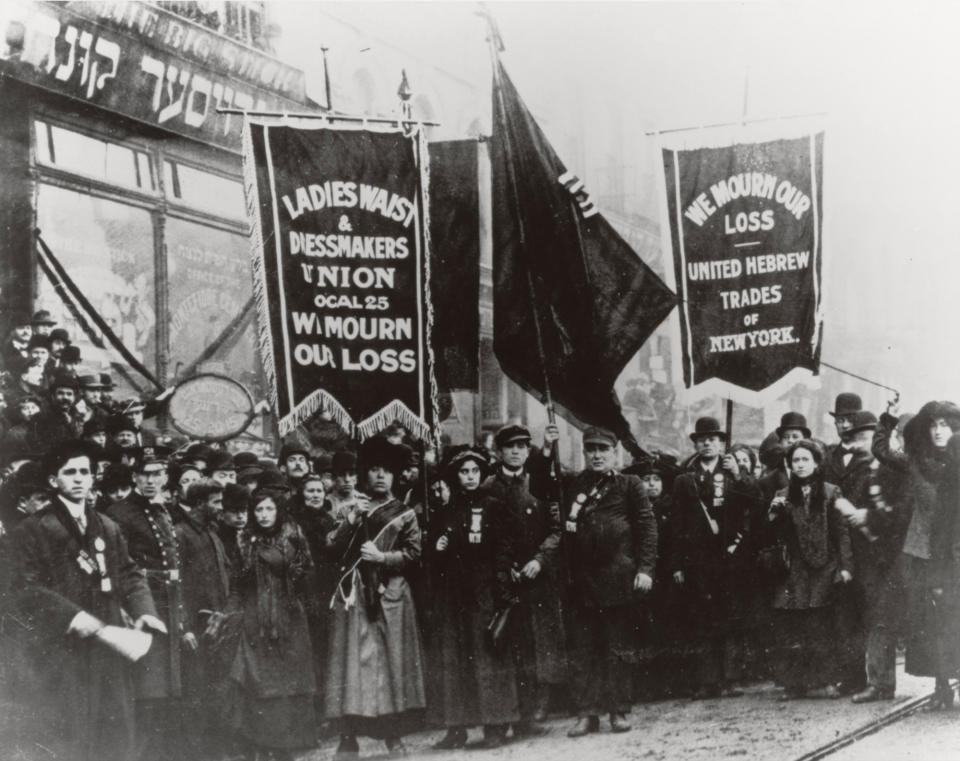 FILE - In this 1911 file photo provided by the National Archives, labor union members gather to protest and mourn the loss of life in the March 25, 1911 Triangle Shirtwaist Factory fire in New York. The fire that raced through a garment factory on Saturday, Nov. 24, 2012 in Bangladesh and killed 112 workers bore eerie echoes of another inferno that burned more than a century ago: the Triangle Shirtwaist factory fire in New York City. (AP Photo/National Archives, File)