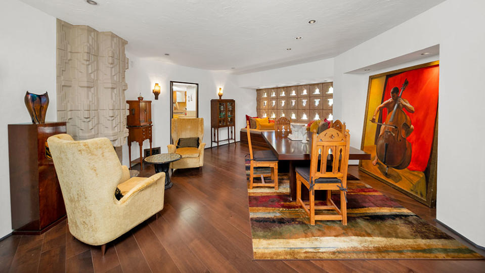 The dining area features the same concrete designs as the exterior of the home. - Credit: Open House Foto