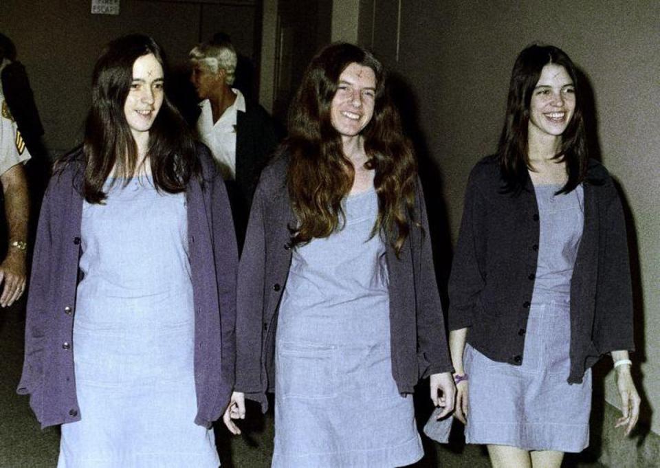 Followers of Charles Manson arrive at court in 1969 (ASSOCIATED PRESS)