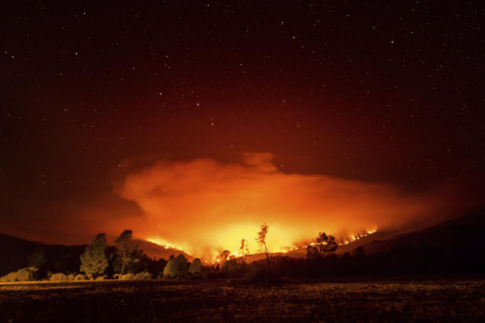 The August Complex Fire burns near Lake Pillsbury in the Mendocino National Forest, Calif., on Wednesday, Sept. 16, 2020. (AP Photo/Noah Berger)