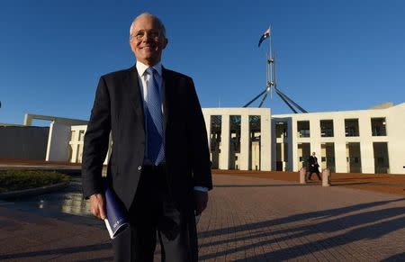 Australian Prime Minister Malcolm Turnbull stands outside Australia's Parliament House in Canberra May 4, 2016 following the announcement Australia's 2016-17 Federal Budget. AAP/Sam Mooy/via REUTERS