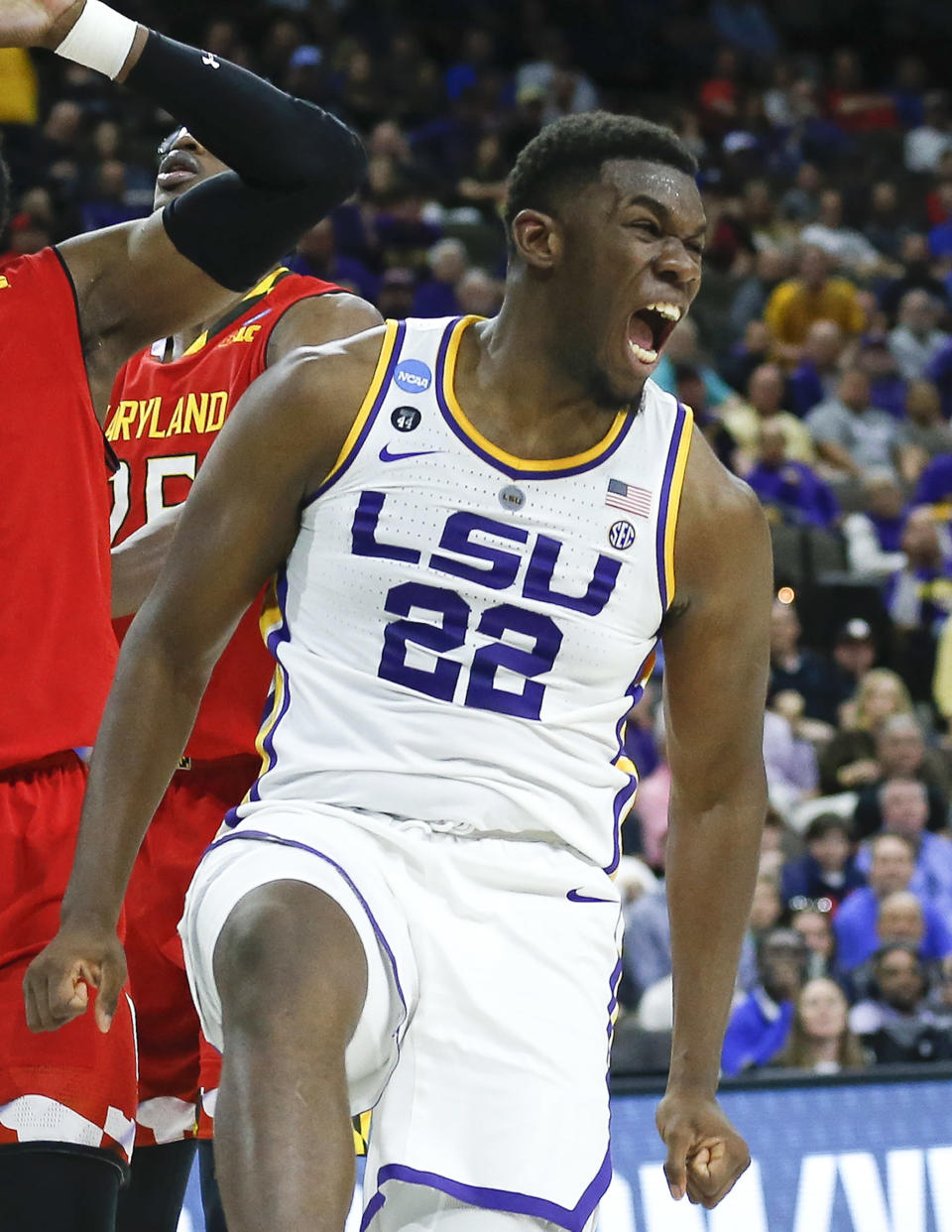 <p>LSU’s Darius Days (22) celebrates after sinking a shot against Maryland during the first half of a second-round game in the NCAA men’s college basketball tournament in Jacksonville, Fla., Saturday, March 23, 2019. (AP Photo/Stephen B. Morton) </p>