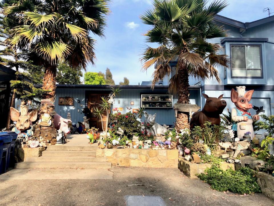A house adorned with sculptures of pigs in Montecito