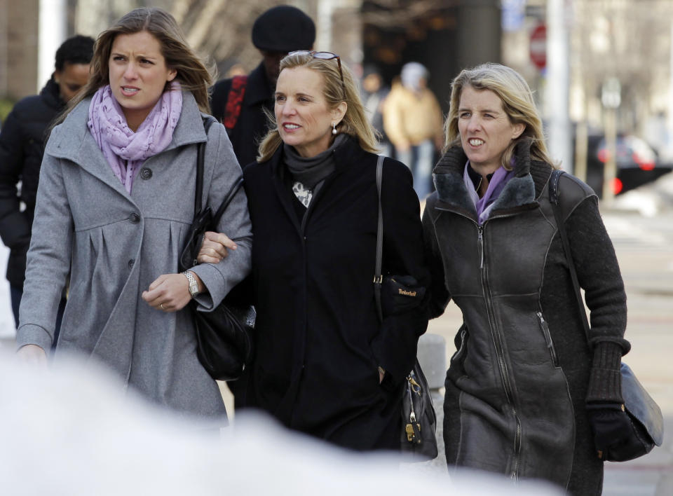 Kerry Kennedy, center, returns to the Westchester County courthouse with family members Wednesday, Feb. 26, 2014, in White Plains, N.Y. Kennedy testified Wednesday that she did not knowingly take a sleeping pill on the day her Lexus swerved into a tractor-trailer on a suburban New York highway. (AP Photo/Frank Franklin II)