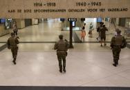 <p>Belgian Army soldiers patrol inside Central Station in Brussels on Wednesday, June 21, 2017. (Virginia Mayo/AP) </p>