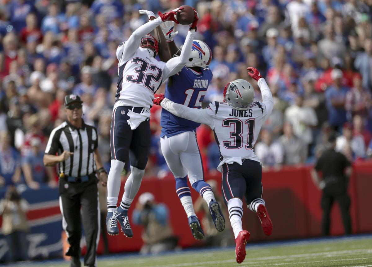 New England Patriots safety Devin McCourty (32) takes the field to