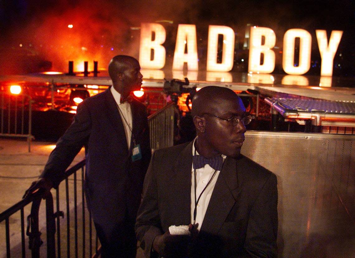 In 2001, security personnel stand guard on the set of video being made Diddy on Watson Island as part of the Source Awards. The video was aired during the awards ceremonies at the Jackie Gleason Theater of the Performing Arts in Miami Beach. “Bad Boy” in the background refers to the title of the video.