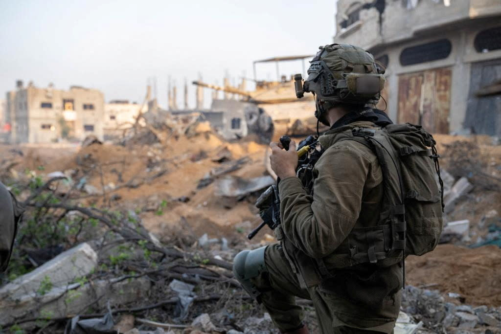 An Israeli soldier takes part in ground operations, amid the ongoing conflict between Israel and the Palestinian Islamist group Hamas, at a location given as Gaza in this handout photo released November 7, 2023. Israeli Defence Forces/Handout via REUTERS    THIS IMAGE HAS BEEN SUPPLIED BY A THIRD PARTY