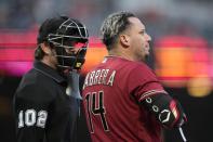 Arizona Diamondbacks' Asdrubal Cabrera (14) reacts after being called out on strikes by home plate umpire Adam Beck during the third inning against the San Francisco Giants in a baseball game Wednesday, June 16, 2021, in San Francisco. (AP Photo/Tony Avelar)