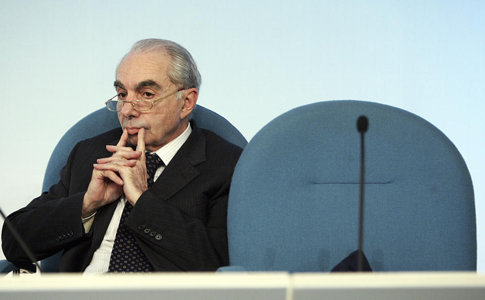 FILE - Italian Interior Minister Giuliano Amato looks on next to an empty seat, during a press conference after a cabinet meeting in Rome's Palazzo Chigi premier's office, Friday March 16, 2007. A former Italian premier is contending that a French air force missile brought down a passenger jet over the Mediterranean Sea in 1980 and is appealing to France's president to respond. The crash of the Italian domestic airliner killed all 81 persons aboard. What caused the crash is an enduring mystery. (AP Photo/Plinio Lepri, File)