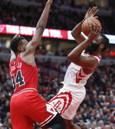Nov 3, 2018; Chicago, IL, USA; Houston Rockets guard James Harden (13) shoots against Chicago Bulls forward Wendell Carter Jr. (34) during the second half at United Center. Kamil Krzaczynski-USA TODAY Sports