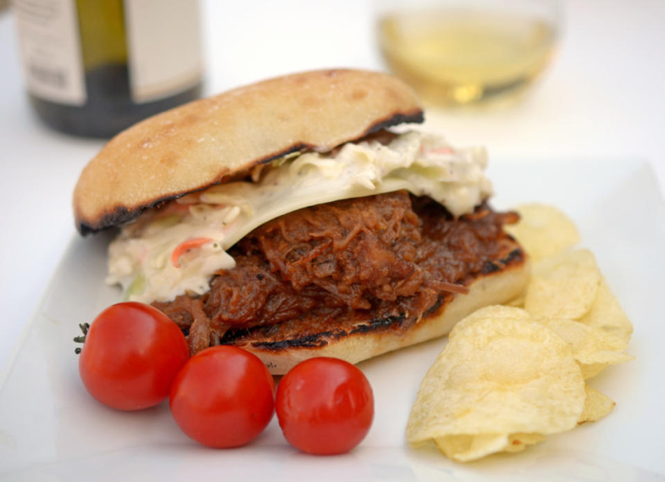 <p>Platter Talk</p><p>You can make these juicy sandwiches in the slow cooker while you are watching the graduate get their diploma. Serve them at the party to follow, relax, and have a great time!</p><p><strong>Get the recipe: <a href="http://www.plattertalk.com/slow-cooker-pulled-pork-sandwiches/" rel="nofollow noopener" target="_blank" data-ylk="slk:Pulled Pork Sandwiches;elm:context_link;itc:0;sec:content-canvas" class="link ">Pulled Pork Sandwiches</a></strong></p>