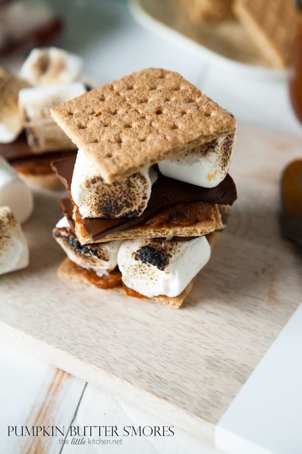 <p>A dollop of homemade pumpkin butter spread on a s'more sounds like heaven on Earth. You can make these without a campfire—just broil the marshmallows!</p><p><strong>Get the recipe at <a href="https://www.thelittlekitchen.net/pumpkin-butter-smores/" rel="nofollow noopener" target="_blank" data-ylk="slk:The Little Kitchen;elm:context_link;itc:0;sec:content-canvas" class="link ">The Little Kitchen</a>.</strong> </p>