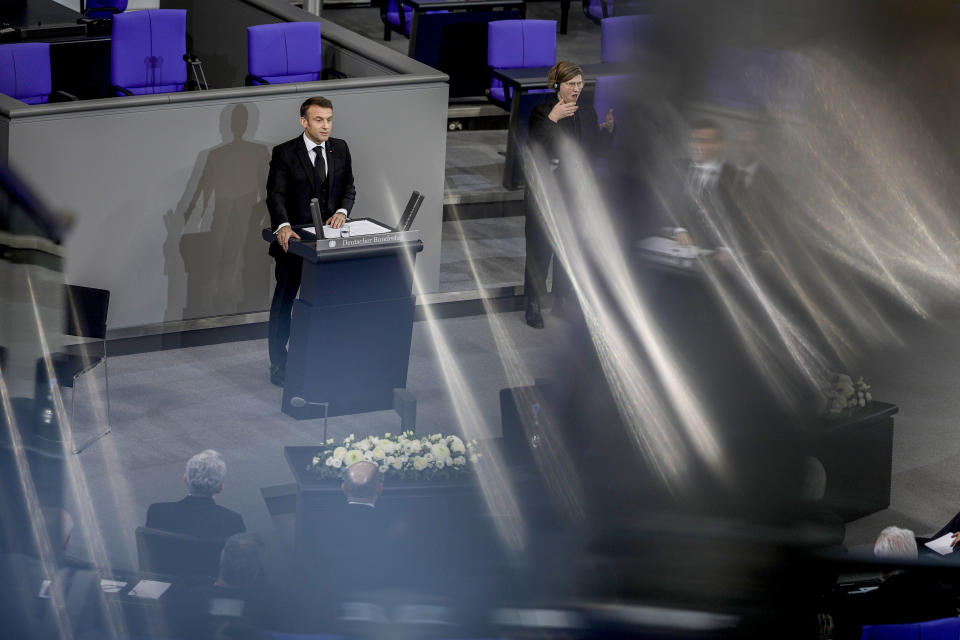 French President Emmanuel Macron delivers a speech during a state ceremony to commemorate late former German finance minister Wolfgang Schaeuble in the German parliament in Berlin, Germany, Monday, Nov.22, 2024. (AP Photo/Markus Schreiber)