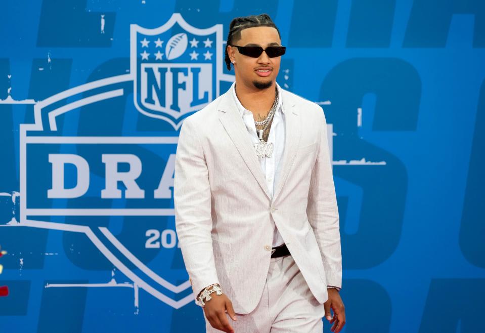 Apr 27, 2023; Kansas City, MO, USA; Ohio State wide receiver Jaxon Smith-Njigba walks the NFL Draft Red Carpet before the first round of the 2023 NFL Draft at Union Station. Mandatory Credit: Kirby Lee-USA TODAY Sports