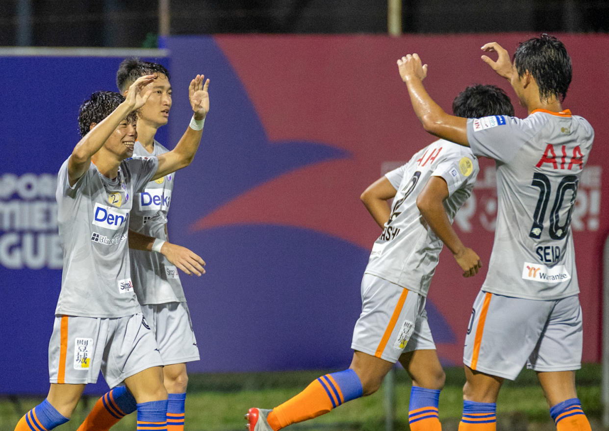 Albirex Niigata (Singapore) players celebrate scoring during their title-clinching win over Tanjong Pagar United in the Singapore Premier League. (PHOTO: SPL)